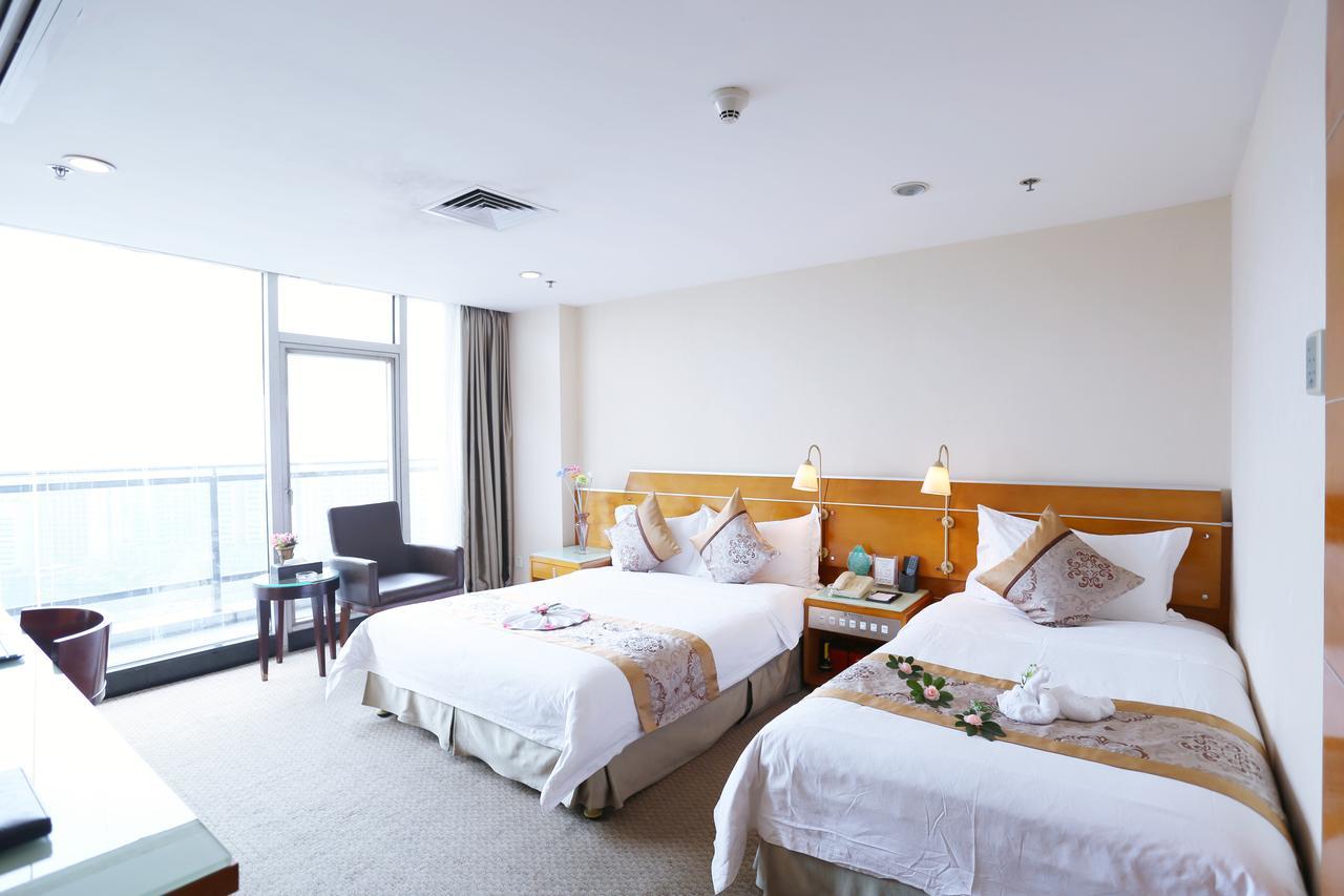 Yihe Hotel Ouzhuang Kanton Zimmer foto